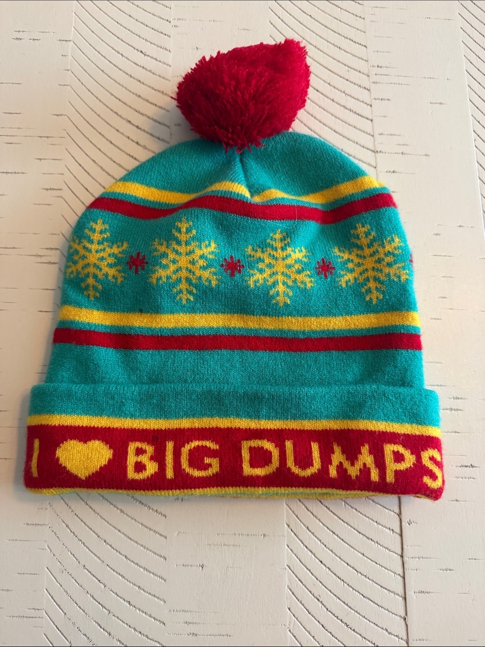 Unisex Turquoise Pom-Pom Beanie with Red & Yellow Snowflake Design